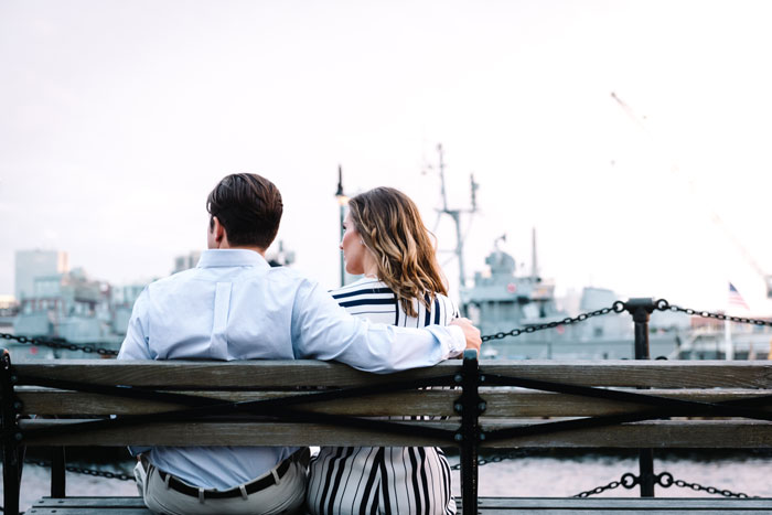 Couple relaxing together outdoors